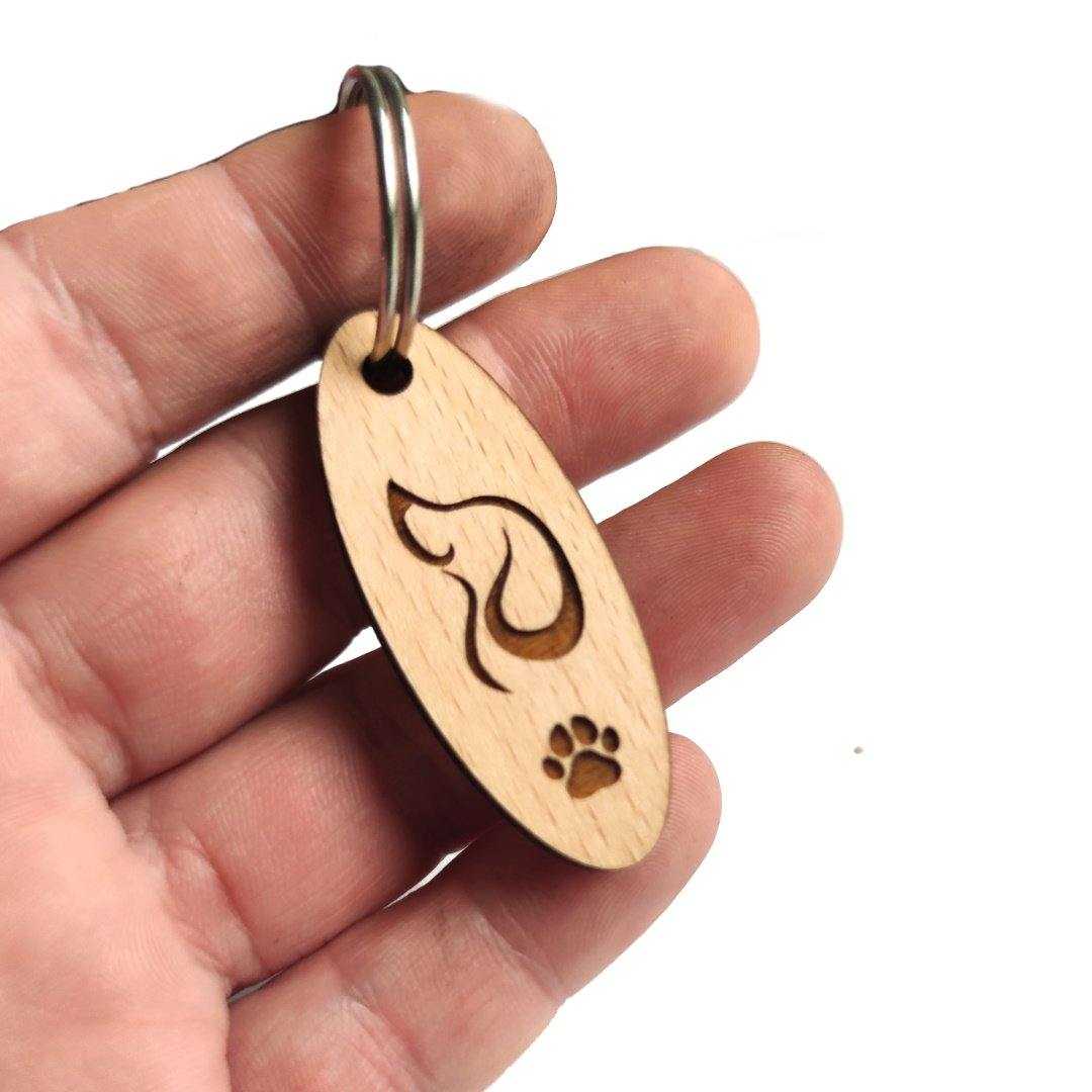 Hundekopf Silhouette mit Schlappohren ovaler Schlüsselanhänger Buchenholz
