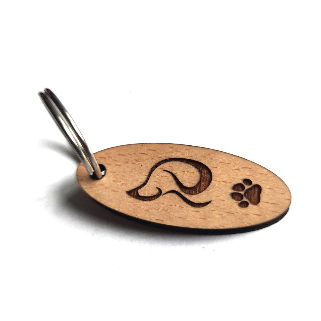 Hundekopf Silhouette mit Schlappohren ovaler Schlüsselanhänger Buchenholz